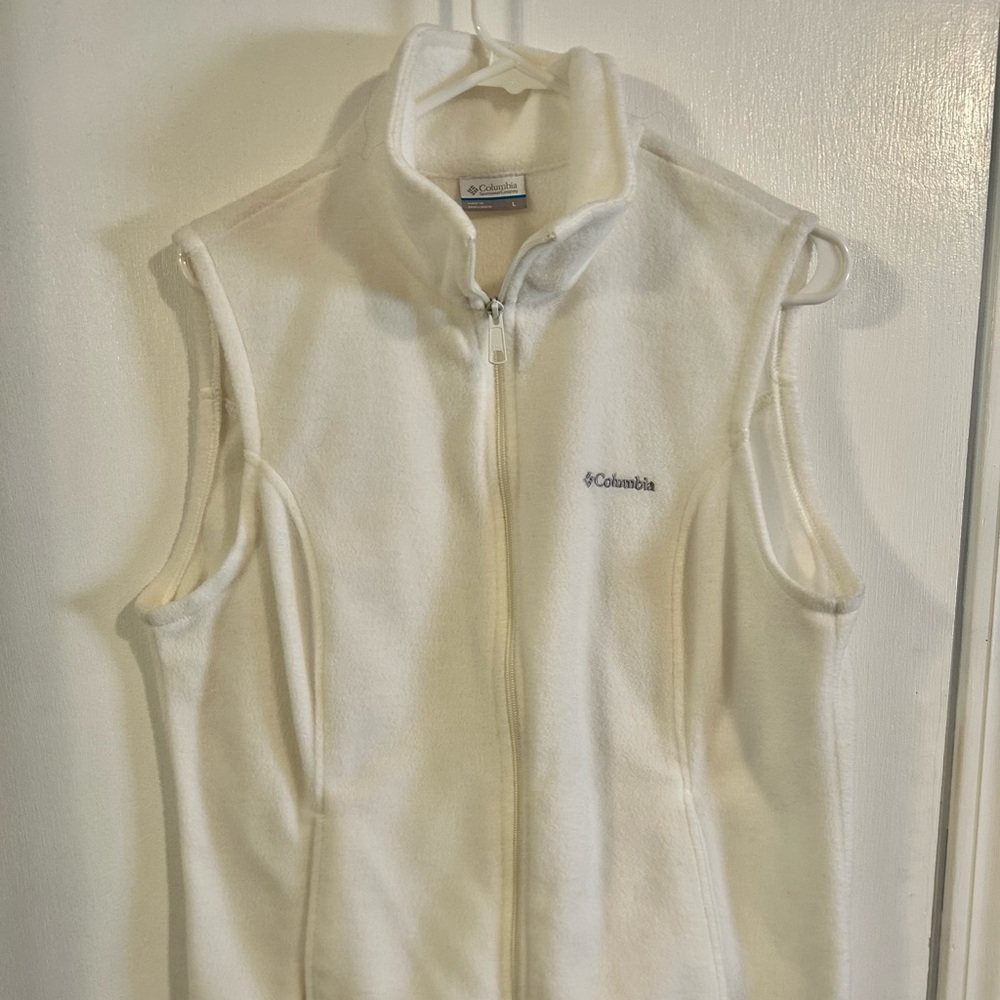 Columbia cream colored, zip front, fleece vest